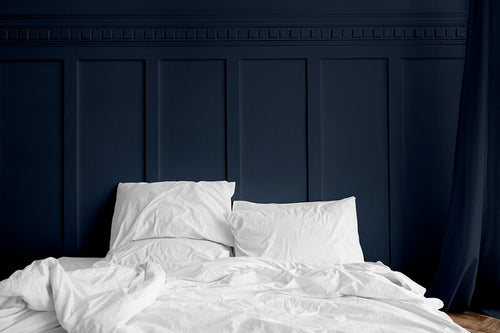 white-bed-linen-mattress-midnight-blue-bedroom-CBD-Sleep-Aid