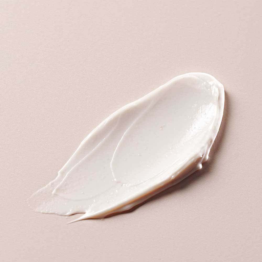 White-Cosmetic-Thick-Cream-Isolate-Smear-on-Pink-Background