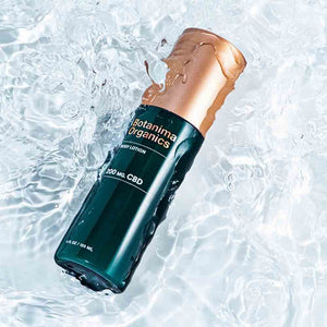 
            
                Load image into Gallery viewer, CBD-Body-Lotion-Dark-Green-Bottle-With-Rose-Gold-Cap-in-Water-Premium-Skincare
            
        