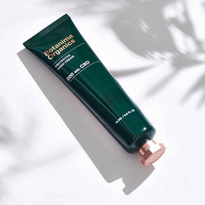 Protective-CBD-Hand-Cream-on-White-Background-With-Leaves-Shadow