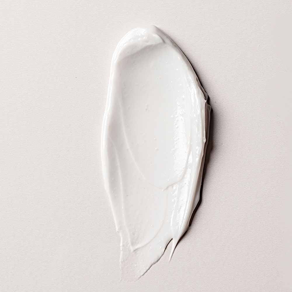 White-Cosmetic-Thick-Cream-Smear-on-Off-White-Background